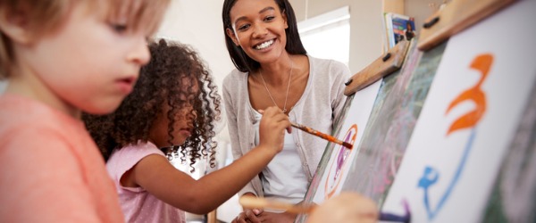 A kindergarten teacher is responsible for integrating young children into the world of learning by teaching them social skills, personal hygiene, basic reading skills, art, and music.